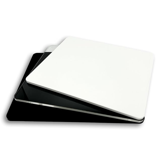 Three stacked acrylic sheets with rounded corners, in white, clear and black