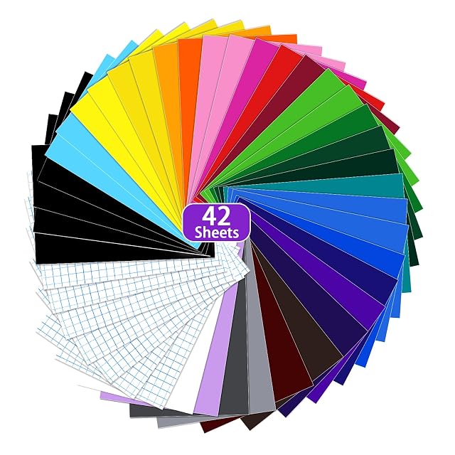 Forty-two sheets fanned in a circle, coloured vinyl with several clear gridded sheets among them