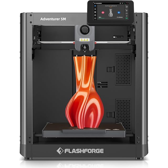 Flashforge Adventurer 5M CoreXY 3D printer with a printed vase on its bed