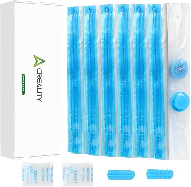 Creality box beside folded bags with blue zips, a round valve and cap, two silica gel packs and two blue zip sliders