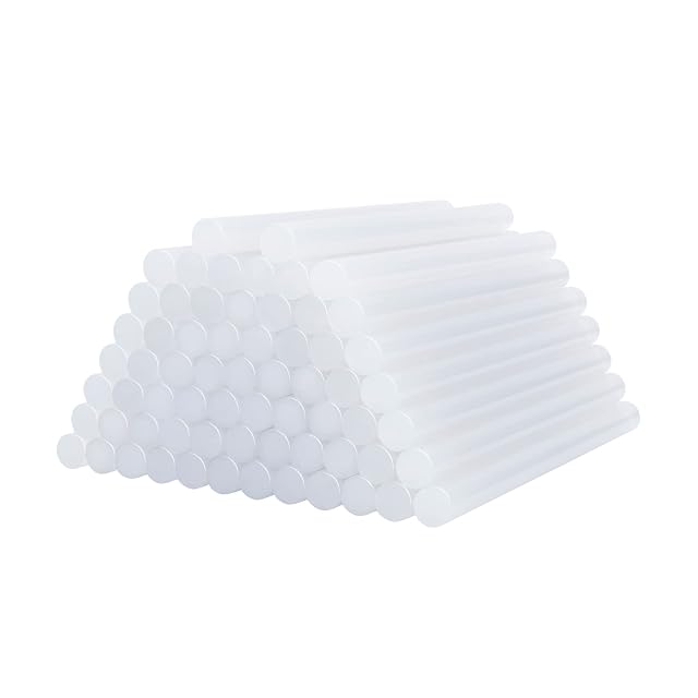 Stack of translucent glue sticks seen end-on