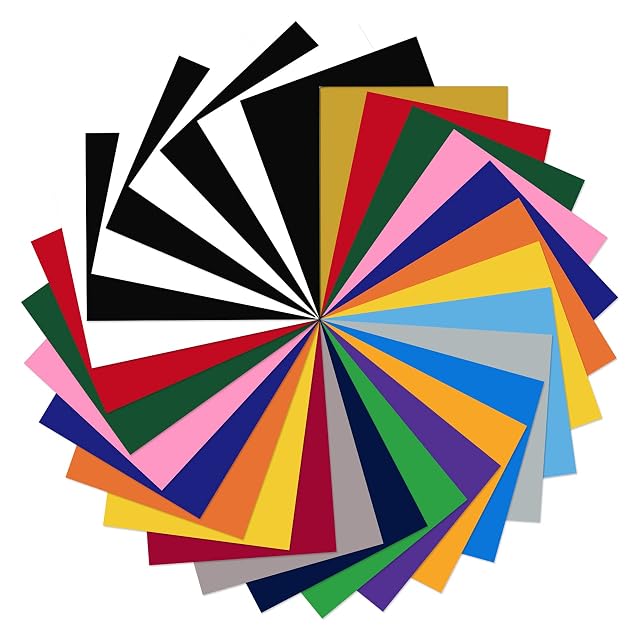 Coloured vinyl sheets fanned in a circle, black and white among them