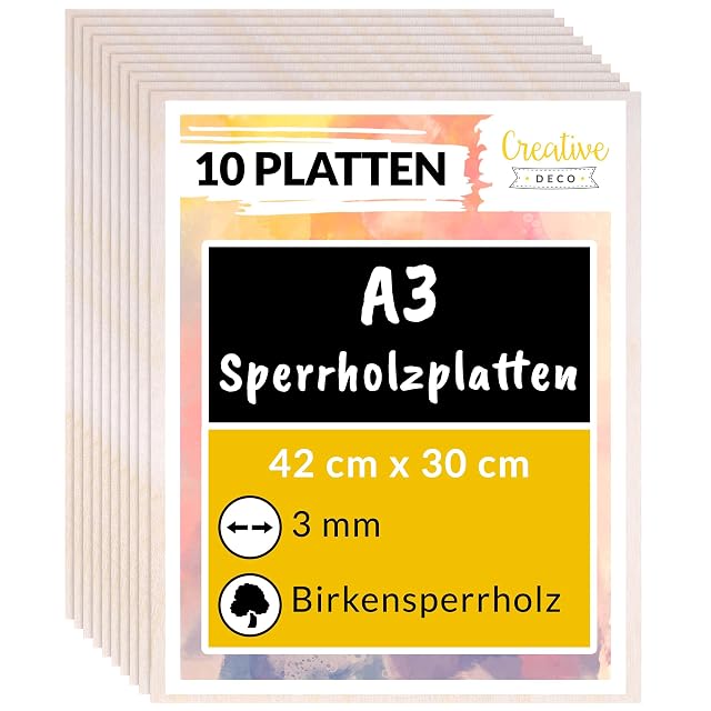 Stack of plywood sheets under a Creative Deco label reading 10 Platten, A3, 42 × 30 cm, 3 mm, Birkensperrholz