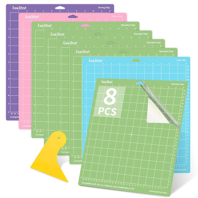 Eight Lya Vinyl mats fanned out — purple Strong, pink Fabric, five green Standard, blue Light — with a yellow scraper