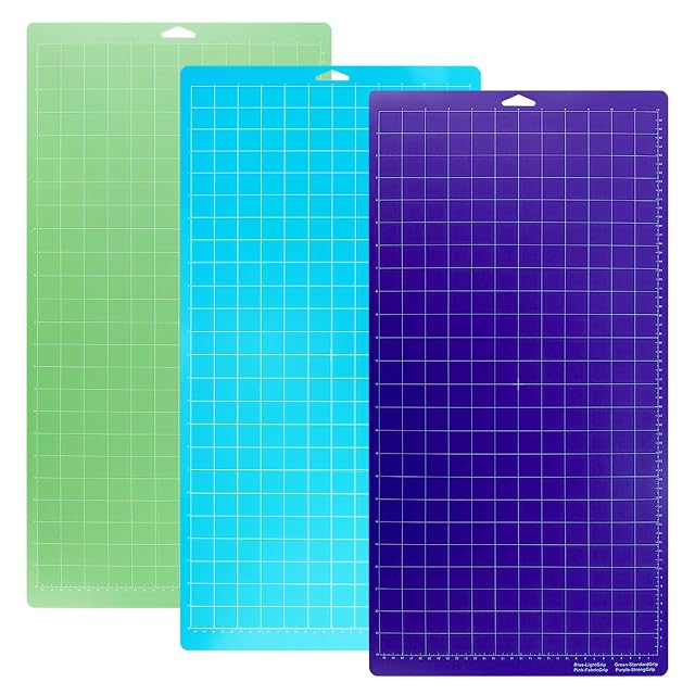 Three long gridded mats in green, blue and purple, the purple one printed with a grip colour key