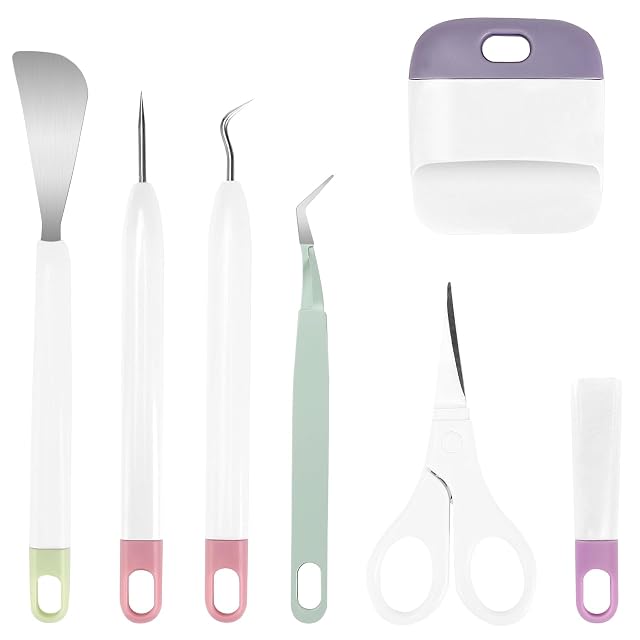Spatula, straight pick, hook, green tweezers, scraper, scissors and a scissor cap